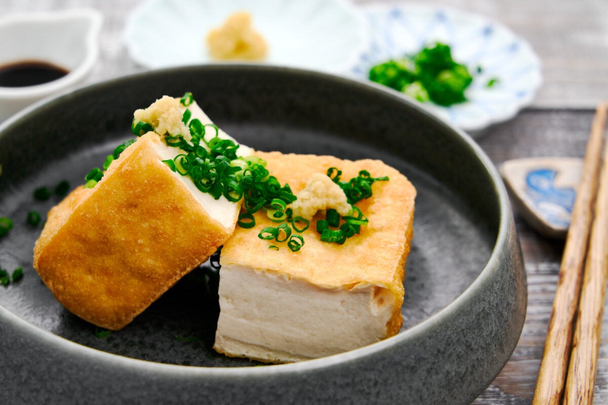 Crispy Atsuaage tofu topped with scallions and ginger makes for a delicious Japanese appetizer.