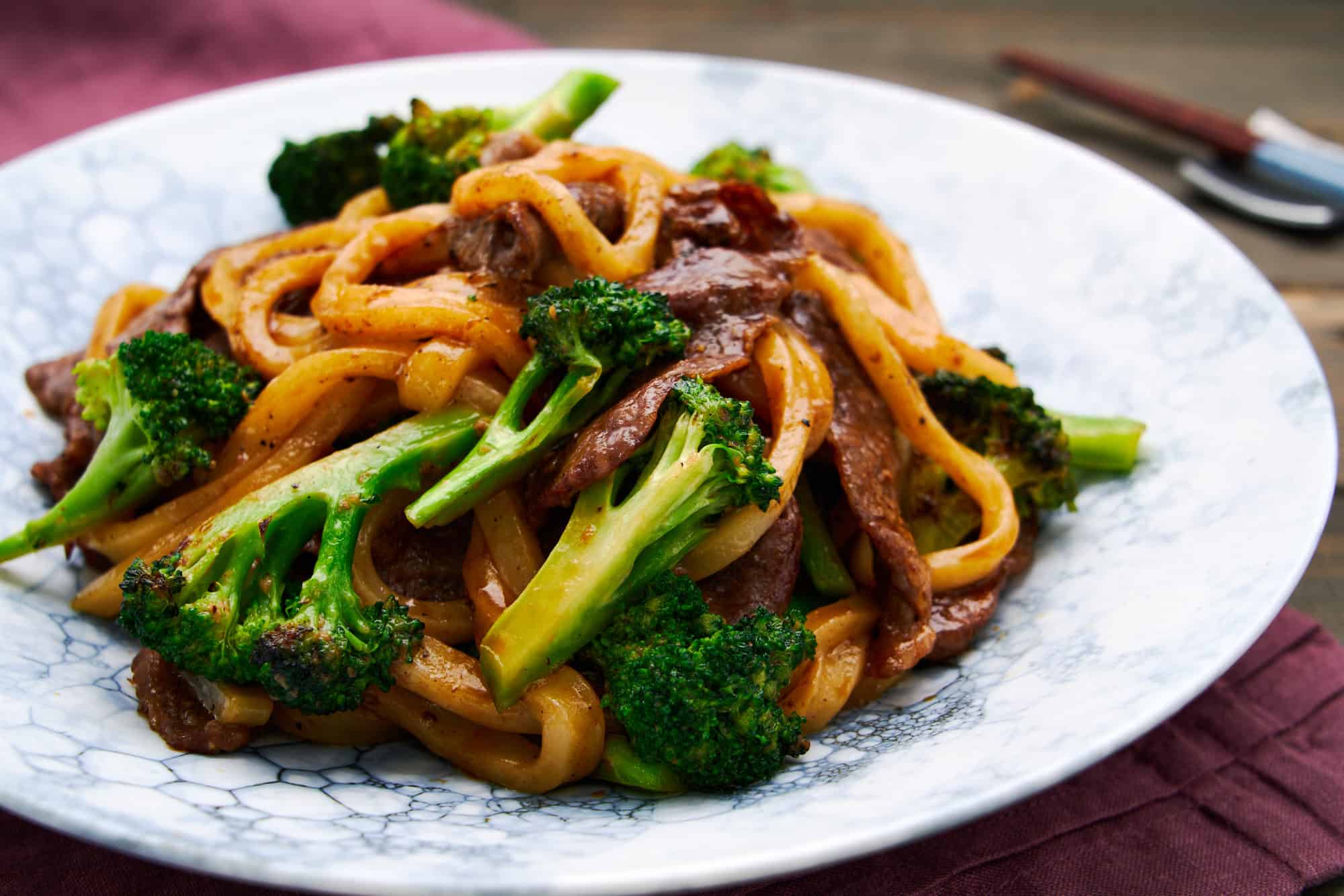 Thick chewy noodles glazed in oyster sauce stir-fried with beef and broccoli.