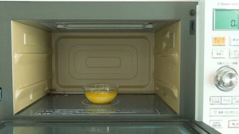 Melting butter in the microwave to make banana bread.