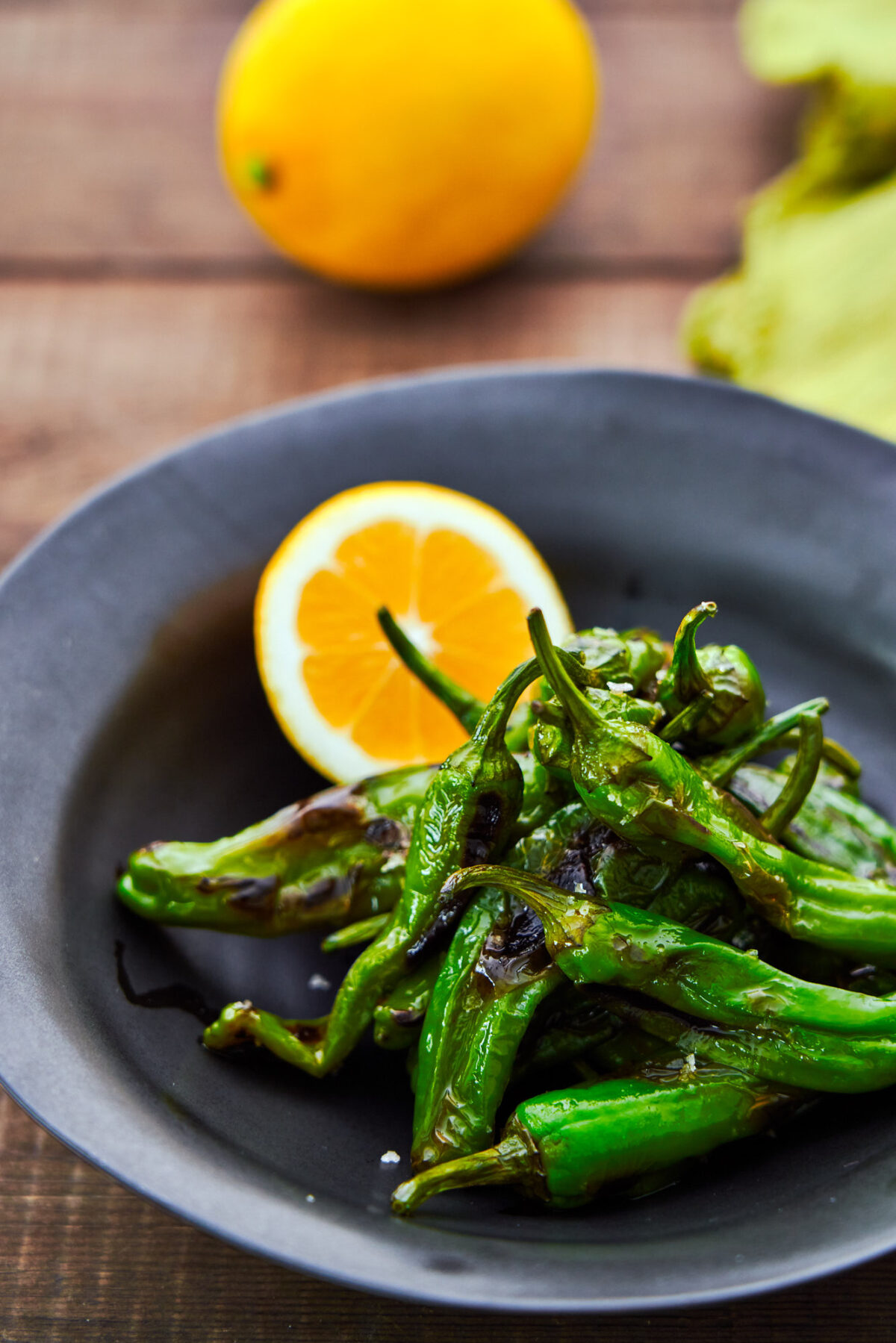 Make these smoky blistered shishito peppers on the stove with this easy dry-roasting technique.