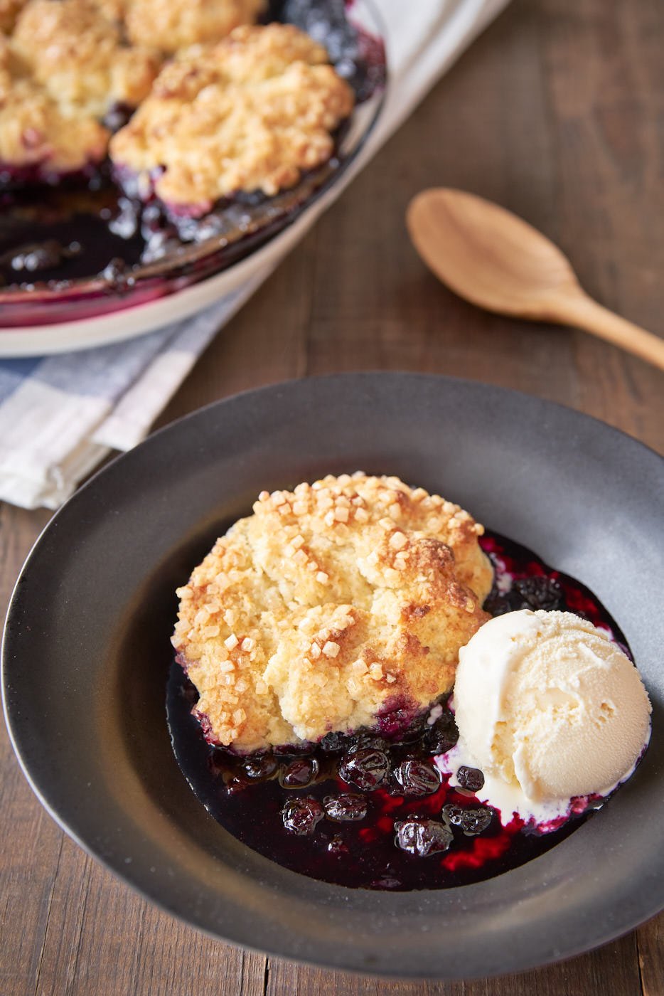 With a sweet and tangy blueberry filling topped with buttery sugared biscuits that are crisp on the outside and fluffy on the inside, this easy blueberry cobbler recipe is amazing.