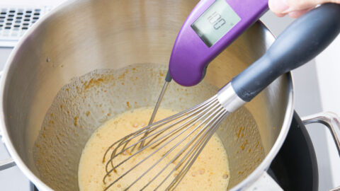 Egg and sugar mixture whisked in a double boiled brought to 100 degrees F for blueberry olive cake.