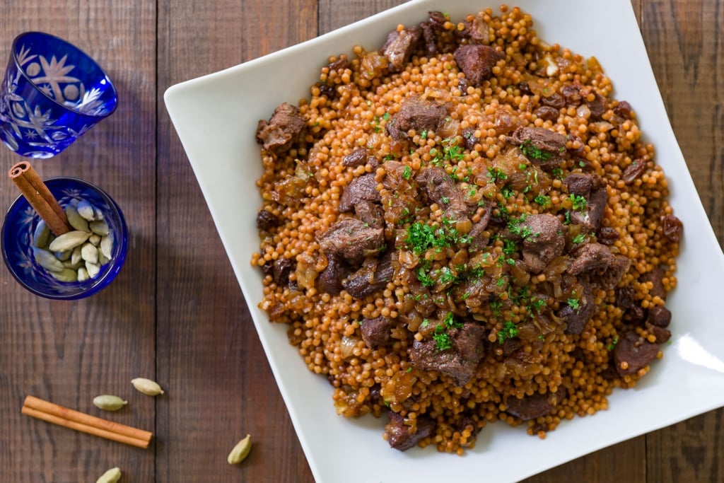 Israeli couscous cooked with lamb, caramelized onions and and raisins.