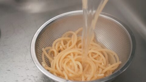 Draining cooked Bucatini for Amatriciana