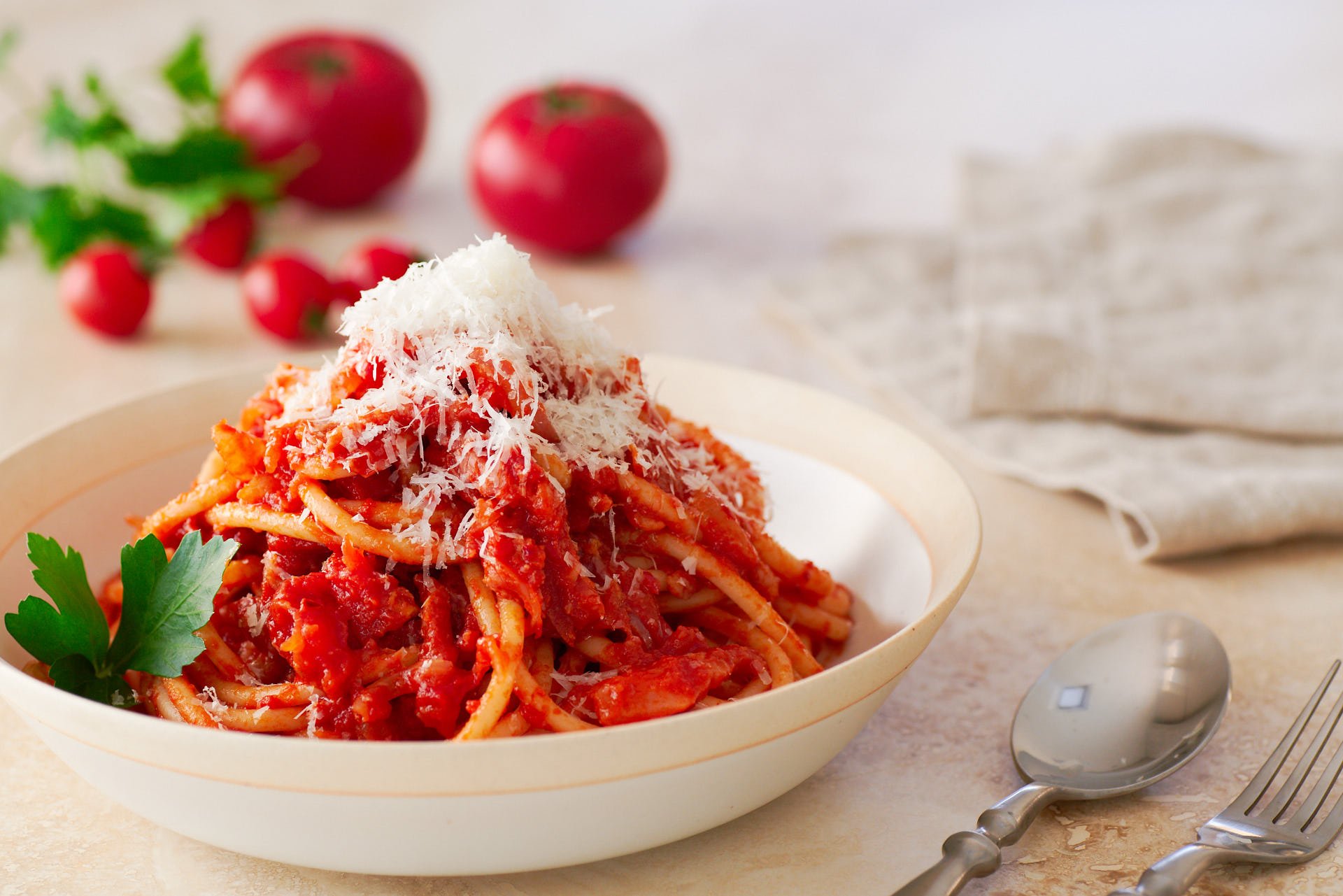 Loaded with Guanciale and Pecorino Romano, Bucatini all'Amatriciana is a quick weeknight pasta that has an unbeatable taste to effort ratio.