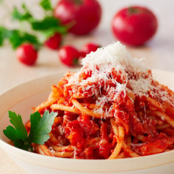 Loaded with Guanciale and Pecorino Romano, Bucatini all'Amatriciana is a quick weeknight pasta that has an unbeatable taste to effort ratio.