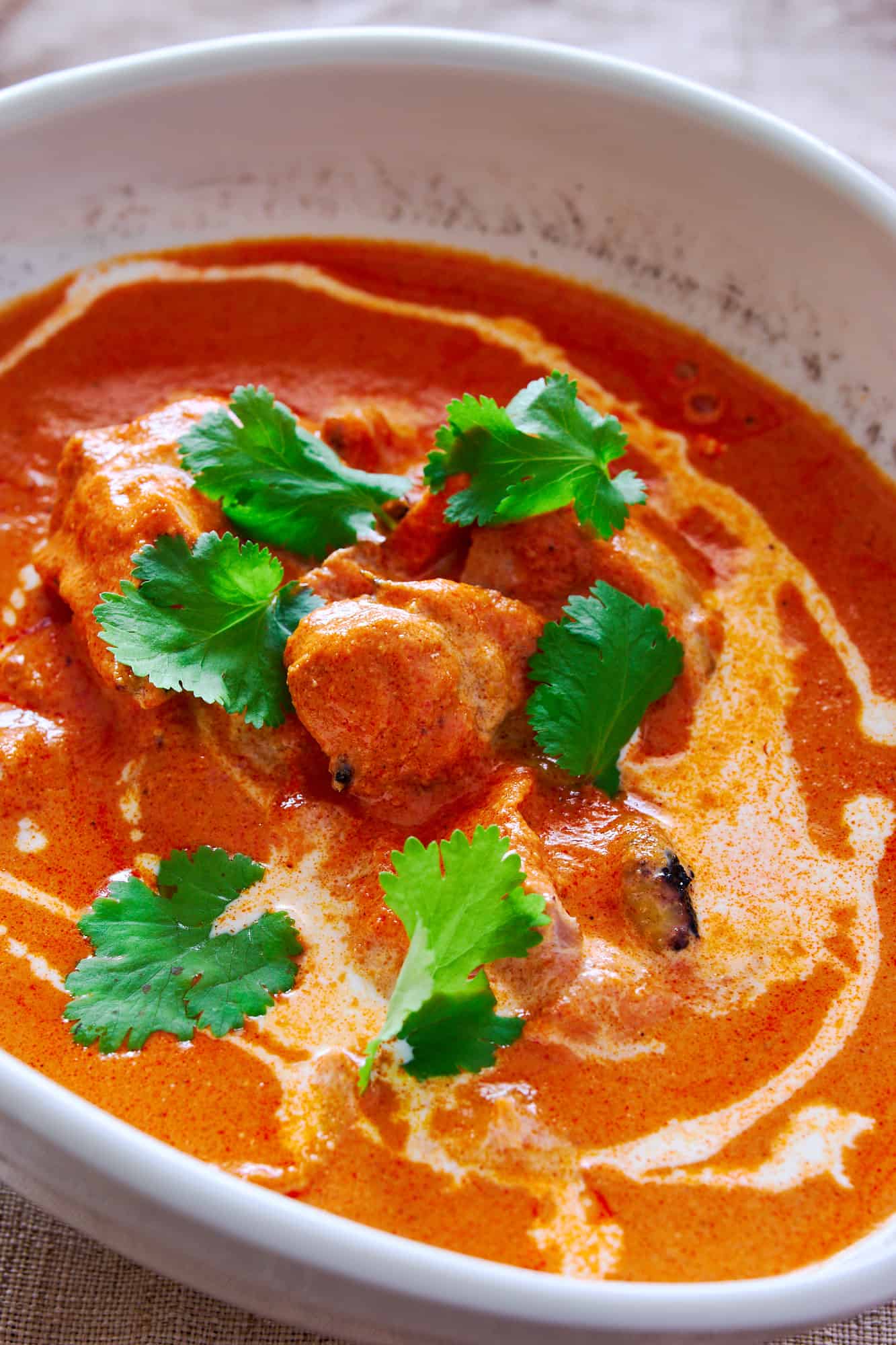 Feast your eyes on this creamy, aromatic butter chicken, where juicy morsels of chicken are bathed in a luscious, fragrant tomato-cream sauce.