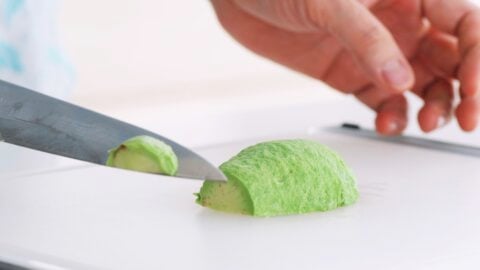 Slicing avocado for making a rose.