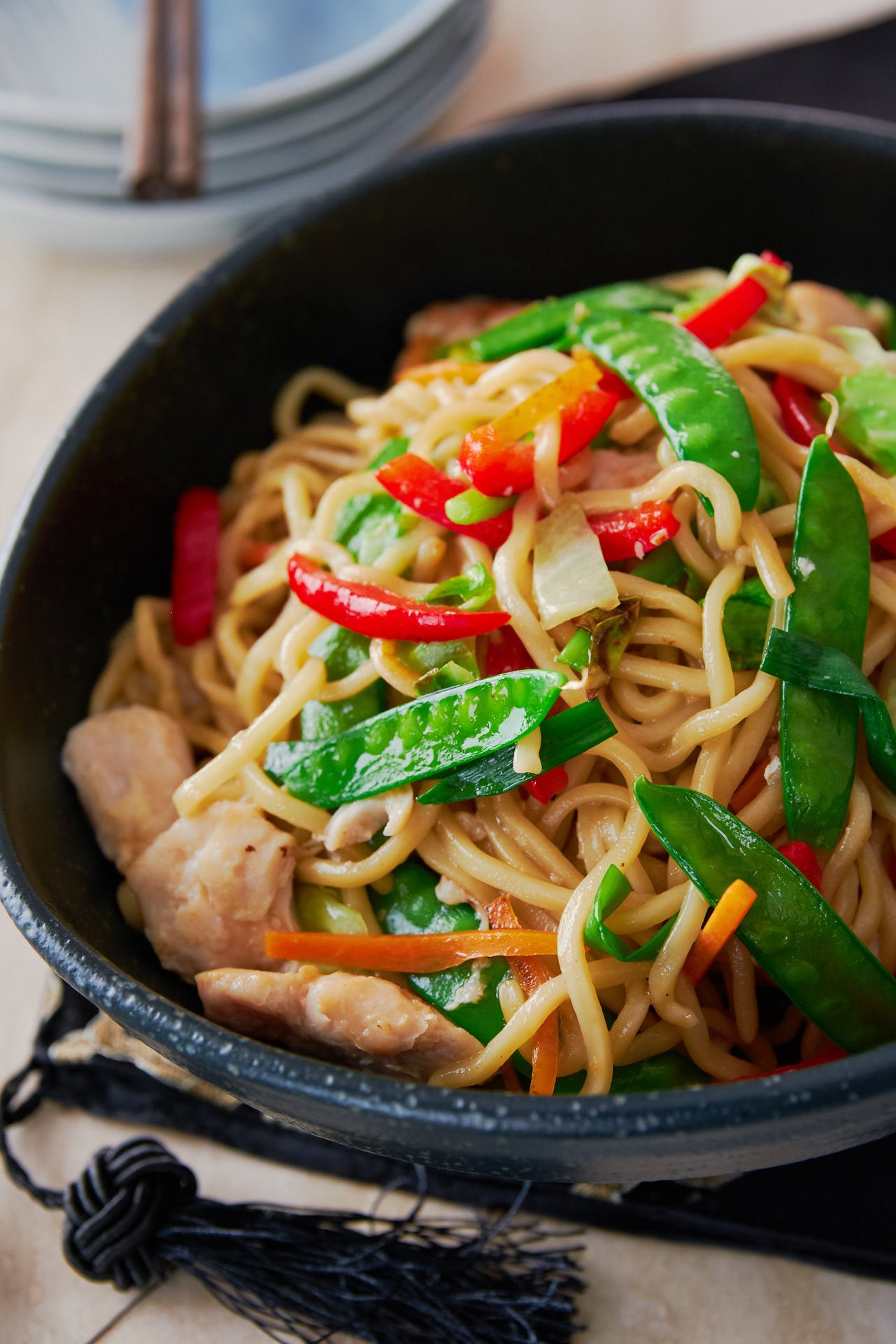 With big chunks of juicy chicken and a rainbow medley of vegetables this Chicken Chow Mein makes for a deliciously balanced one pan meal.