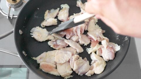 Marinated chicken stir-fried with ginger and garlic for making the best chicken Chow Mein recipe.