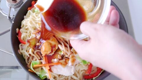 Sauce going into Chow Mein stir-fried noodles.