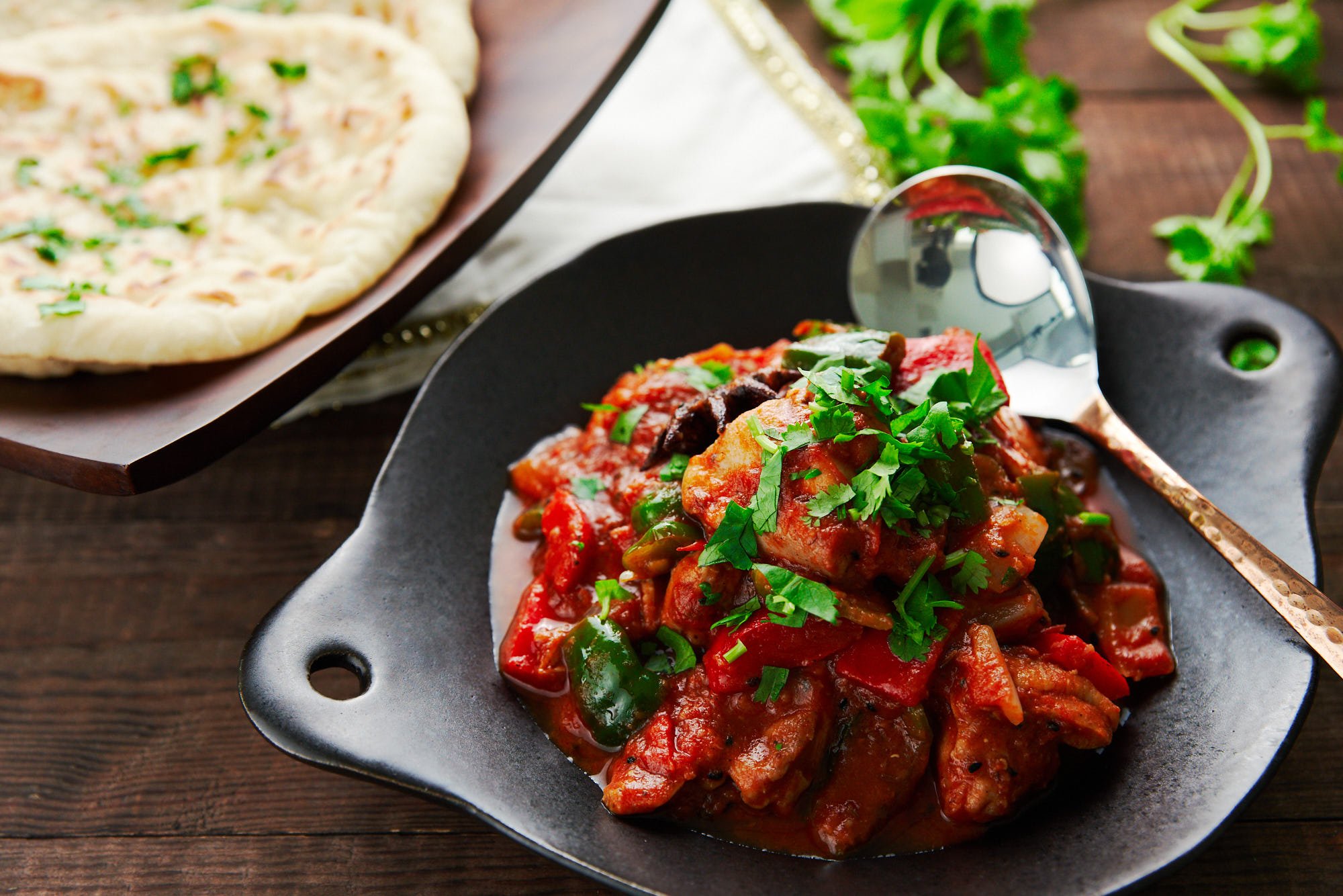 Easy Chicken Jalfrezi recipe with buttered naan.