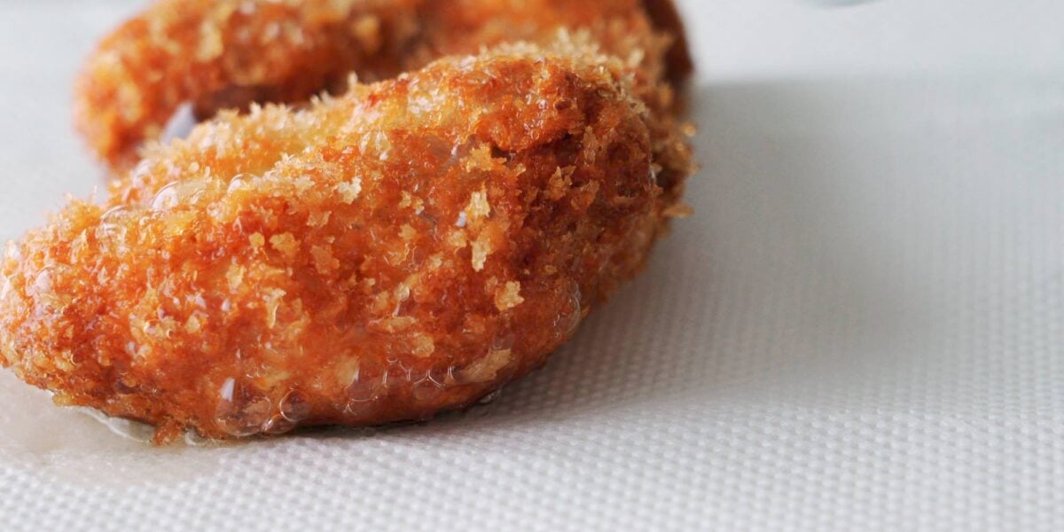 Fried Chicken Katsu draining on paper towels.