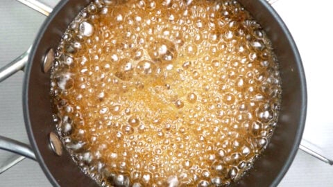 Making Nanban sauce from soy sauce, sake, sugar, ginger and vinegar.