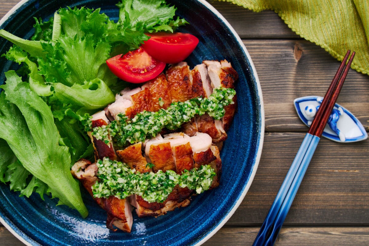 This easy weeknight chicken is pan-fried until the skin is crackling crisp and served with a ridiculously flavorful ginger scallion oil on top.