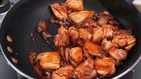 Chicken teriyaki in a frying pan.