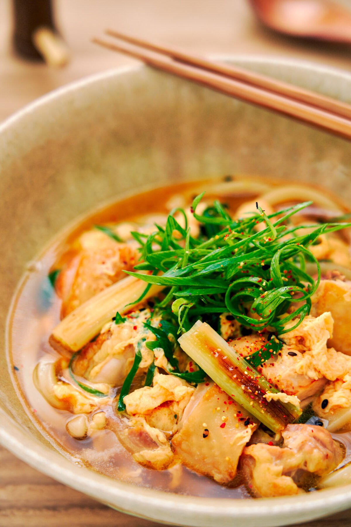 With big chunks of juicy chicken and thick udon noodles in a savory Japanese chicken soup, this easy Chicken Udon recipe comes together in under 10 minutes.