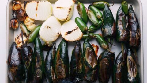 Char-roasted green chili peppers, onions, and garlic.