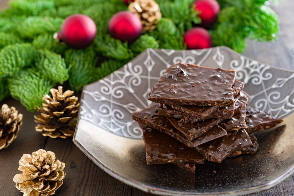 A delightful holiday chocolate brittle loaded with cacao nibs.