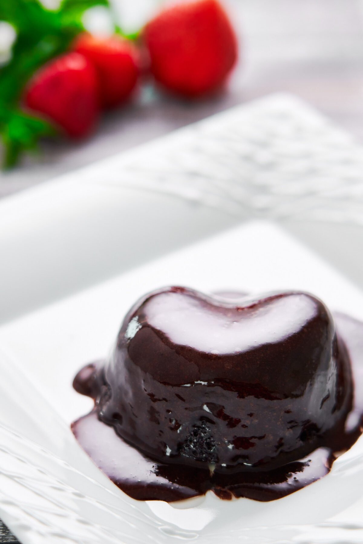 This 1-Minute molten lava Chocolate Mug Cake is a decadent chocolate cake enrobed in gooey chocolate sauce and comes togehter from a handful of pantry ingredients.