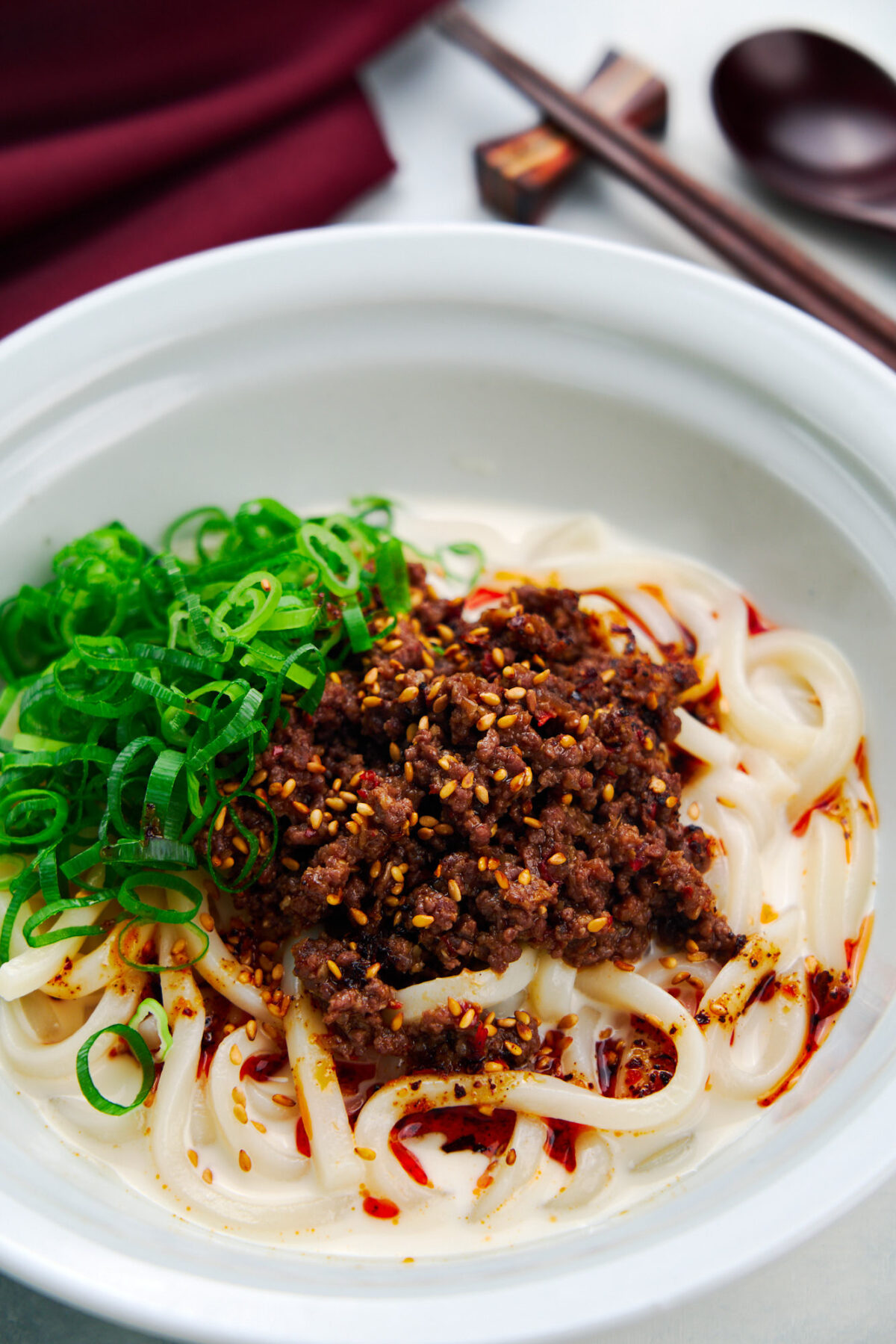 With thick, springy udon noodles in a bowl of chilled sesame broth with a fiery topping of beef and chili oil, this TanTan Udon is the perfect summer noodle dish.