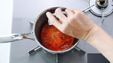 Making dashi broth for somen dipping sauce.