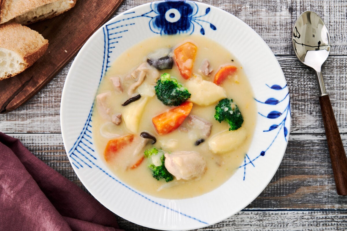 Bowl of Japanese Cream Stew with chicken, vegetables and mushrooms in a delicious cream gravy.