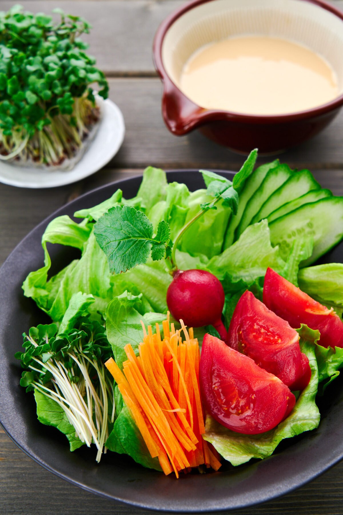 This Japanese salad with an easy creamy sesame dressing (goma dressing) has a rainbow of colors, textures and tastes which makes it a great appetizer for any Japanese meal.