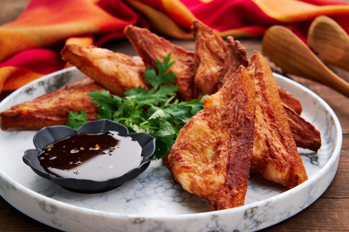 Crispy shrimp toast triangles with sweet chili sauce.