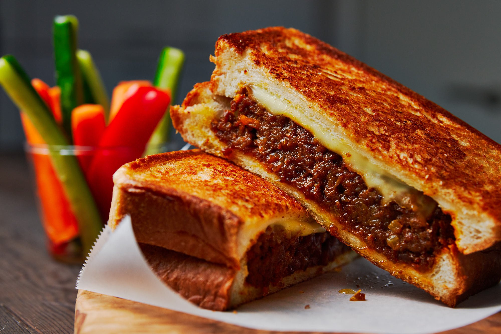 With spicy savoy curry and molten cheese stuffed between two buttery slices of crisp sandwich bread, this mashup of Japanese Curry Bread and a Grilled Cheese Sandwich is irresistibly good.