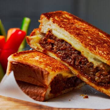 With spicy savoy curry and molten cheese stuffed between two buttery slices of crisp sandwich bread, this mashup of Japanese Curry Bread and a Grilled Cheese Sandwich is irresistibly good.