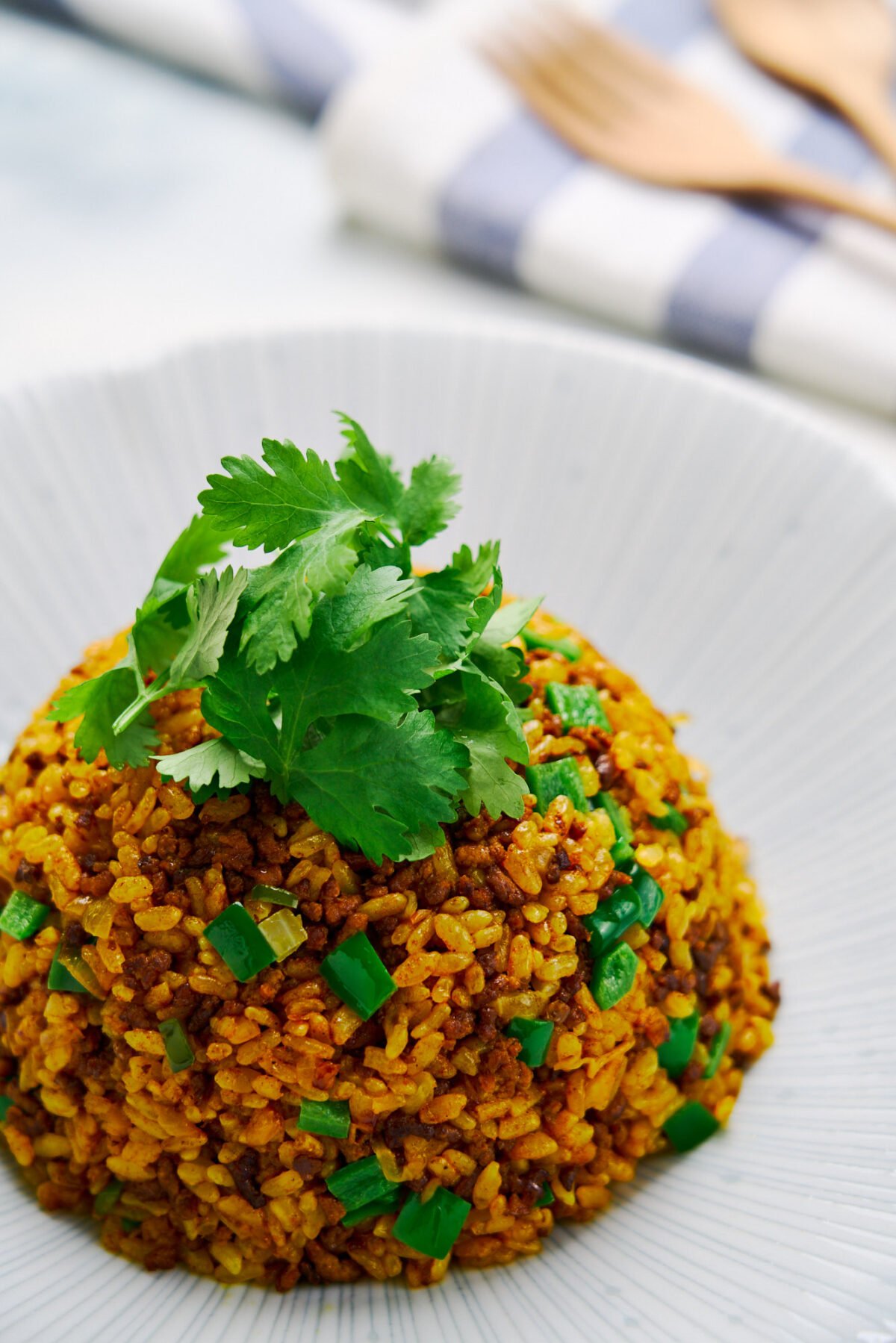 With ground beef and caramelized onions, this easy curry fried rice tastes like a big bubbling pot of Japanese Curry.