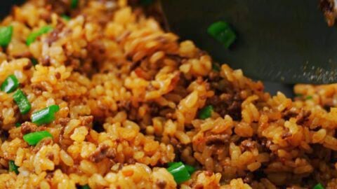 Japanese curry fried rice in a frying pan.