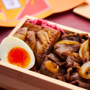 The predecessor to Gyudon, Gyunabe is a historical Japanese dish that shows up in a bento box in Demon Slayer.