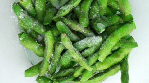 Scrubbing fresh edamame with salt removed the fine hairs.