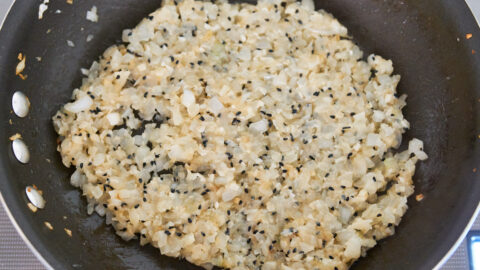 The best curry starts with a base of caramelized aromatics. This pan has caramelized onions, ginger, garlic and nigella seeds.