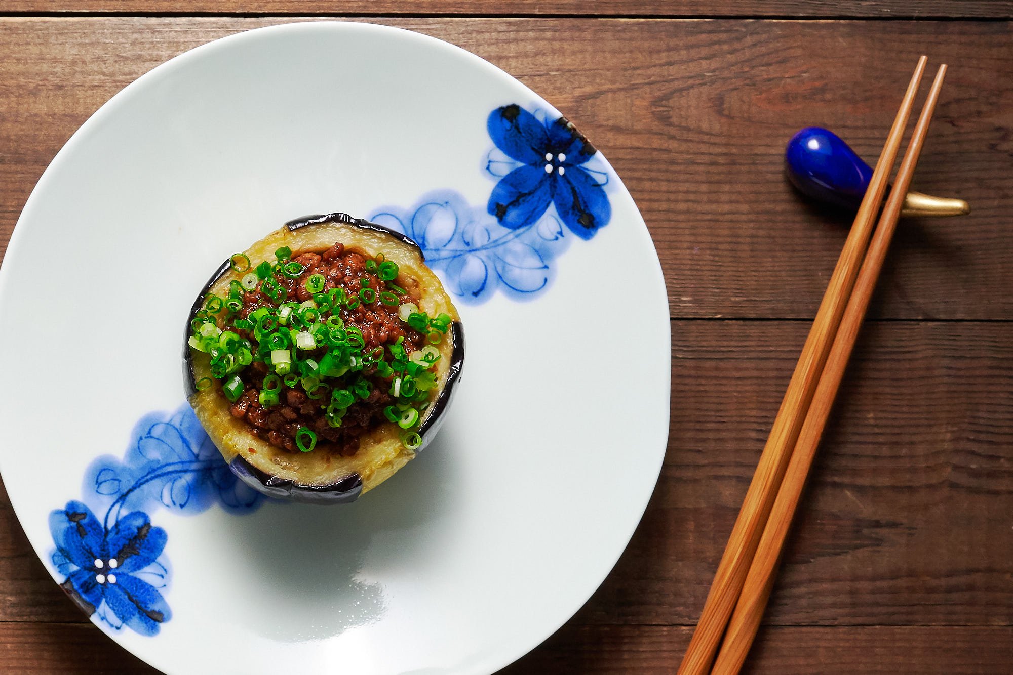 With a tender eggplant cup filled with meat that's been glazed with sweet miso and ginger, this eggplant Dengaku is hearty enough to serve as an entree.