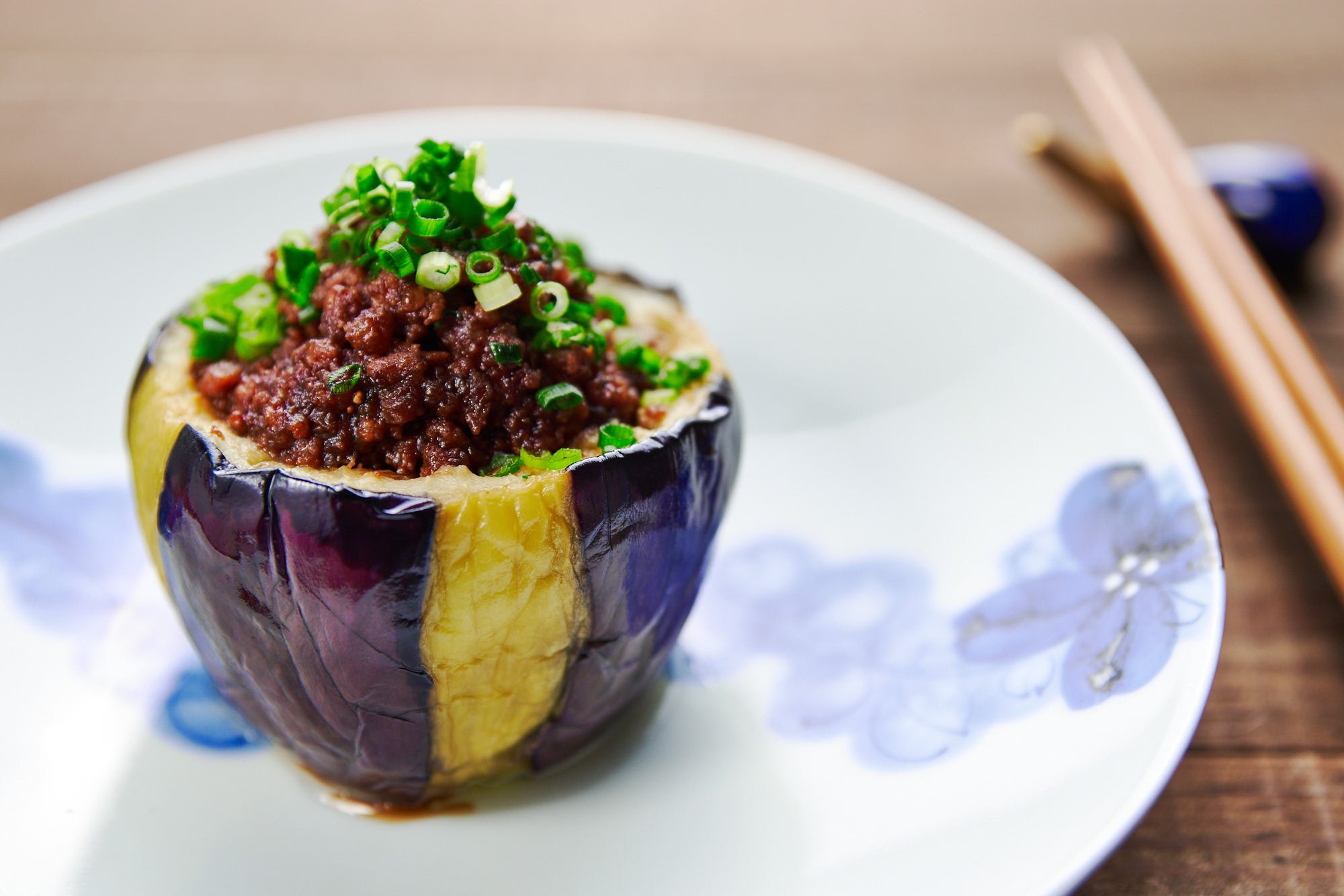 Caramelized miso and meat get stuff into a tender, creamy eggplant cup to make this Japanese Nasu Dengaku.