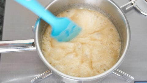 Stir the sugar and butter mixture continuously until the toffee forms.