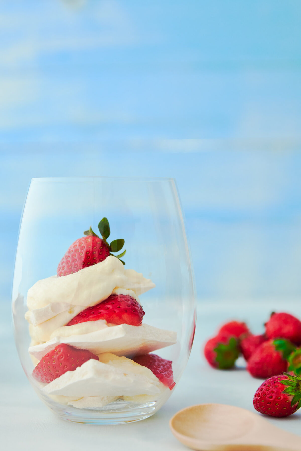 This Eton Mess recipe is a scrumptions British dessert made with layers of white chocolate cream, crisp meringue and strawberries.