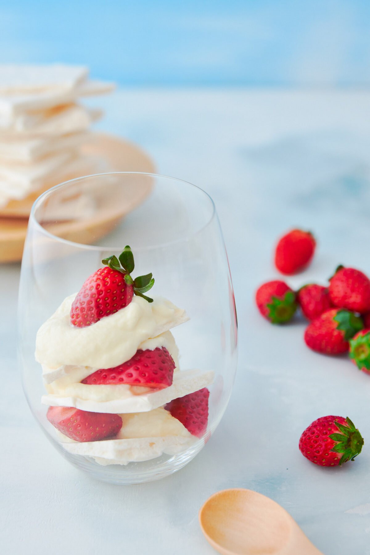 With fresh strawberries, white chocolate cream, and crisp meringue this Eton Mess recipe is a mind-blowinglh good dessert that's the perfect end to a spring dinner party.