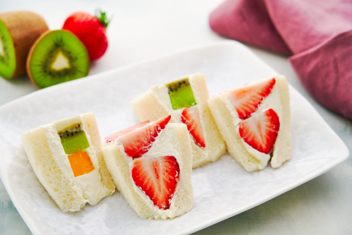 Mixed fruit sandwiches stuffed with strawberries, kiwifruit, and mango are a teatime favorite in Japan.