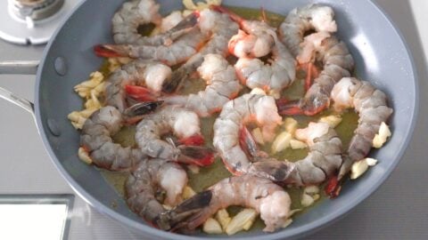 Shrimp sautéing in garlic infused olive oil.