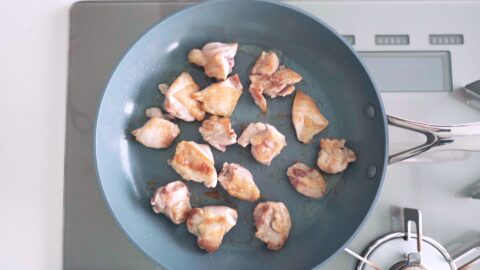 Pan-fried chicken thighs for ginger chicken bento.