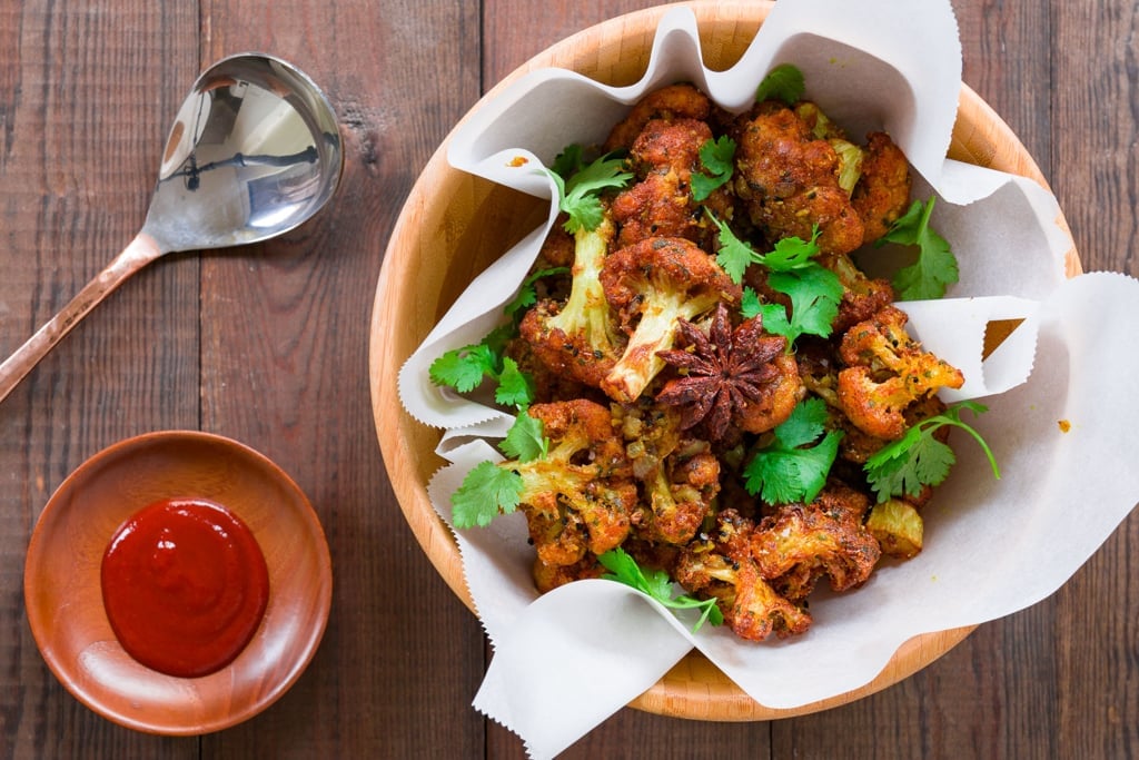 Gobi 65 is a delicious appetizer with crispy fried cauliflower tossed with tempered spices, garlic and ginger.