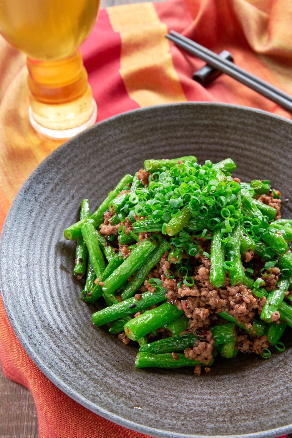 This easy Green Bean Stir Fry recipe is loaded with tender vibrant green beans and ground pork seasoned with a delicious chili garlic black bean sauce.