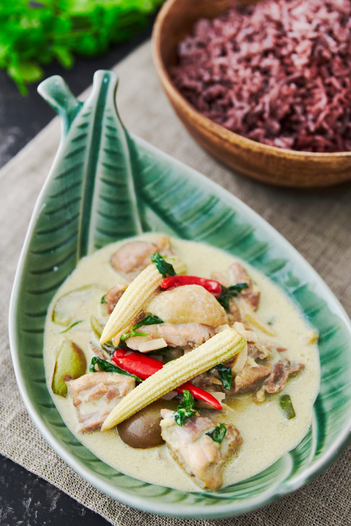 With tender chunks of chicken cooked in a fragrant green curry sauce with eggplant, baby corn and bamboo, this classic Thai recipe is a quick fix that's sure to please. Serve it with a side of riceberry for a stunning green and purple contrast.