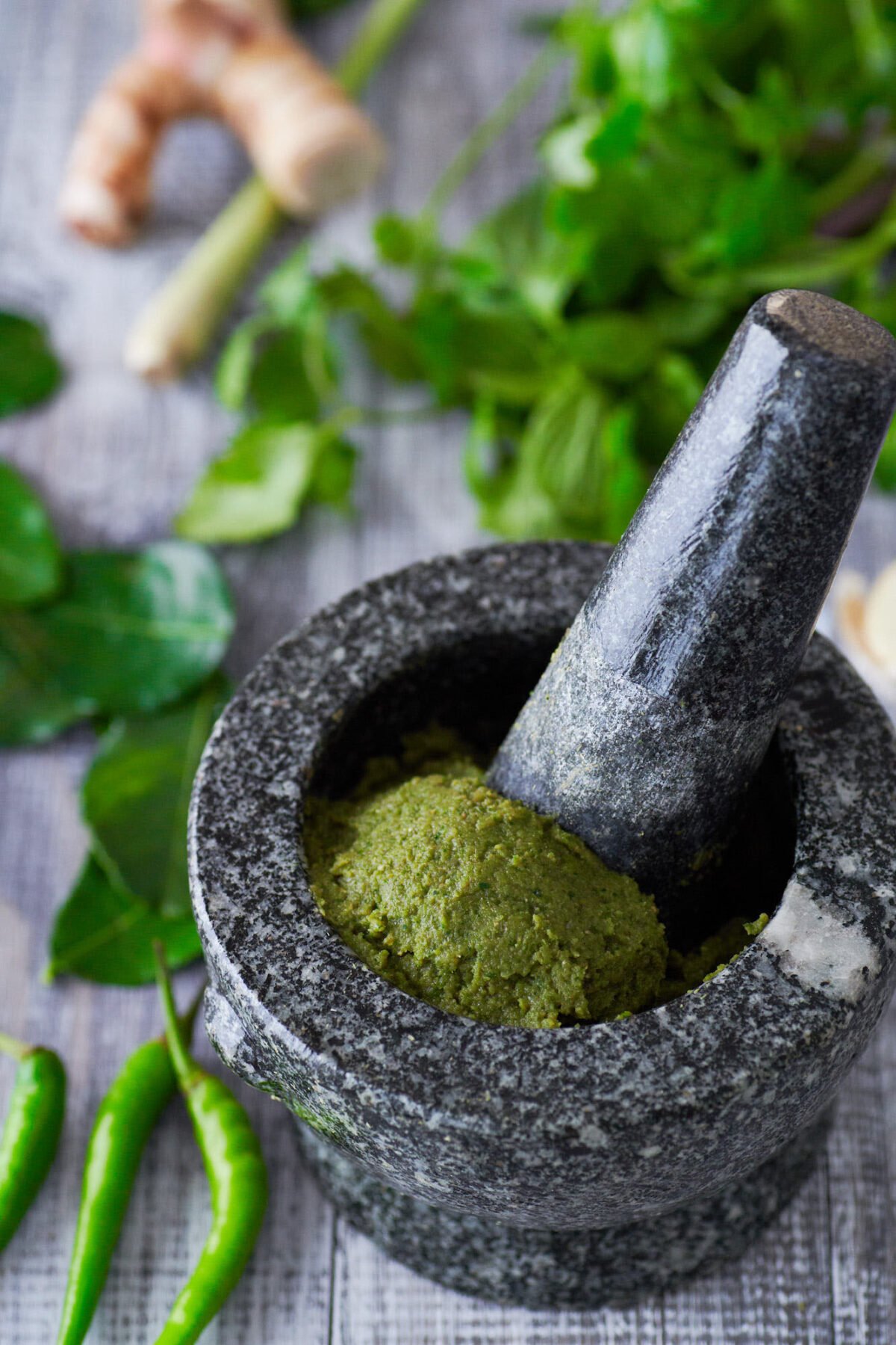 Loaded with Thai herbs and spices and a fiery kick from green chilies, this fragrant green curry paste is the base for a great curry. Best of all, it's plant-based so it's up to you whether you want to load it up with chicken or go vegan with tofu and eggplant.