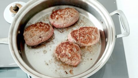 Browned Japanese single serving meatloaf in a pan.