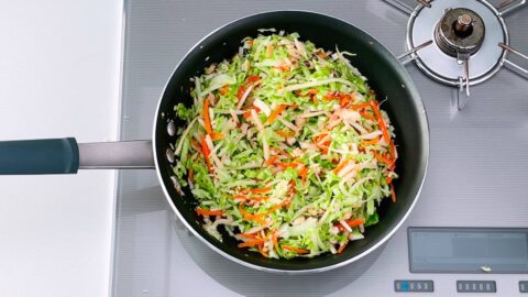 Shredded cabbage, carrots, mushrooms and bamboo for making Japanese-style spring rolls.